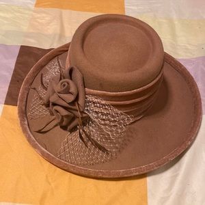 Brown hat with flowers in the front